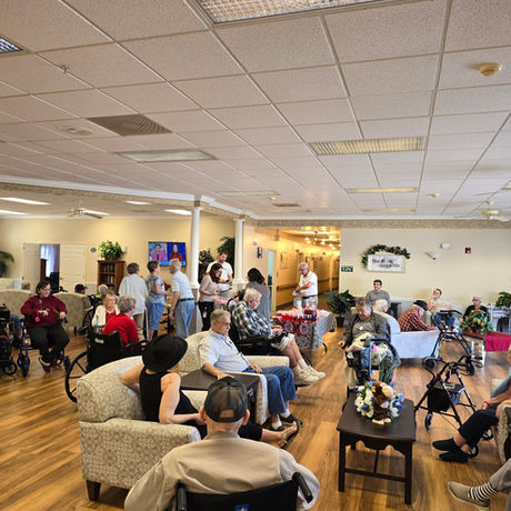 Residents socializing in a welcoming assisted living in Florida community.