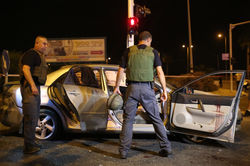 A rocket fired from Gaza hit a vehicle 4 wounded Gan Yavne Ashdod 22.8.14