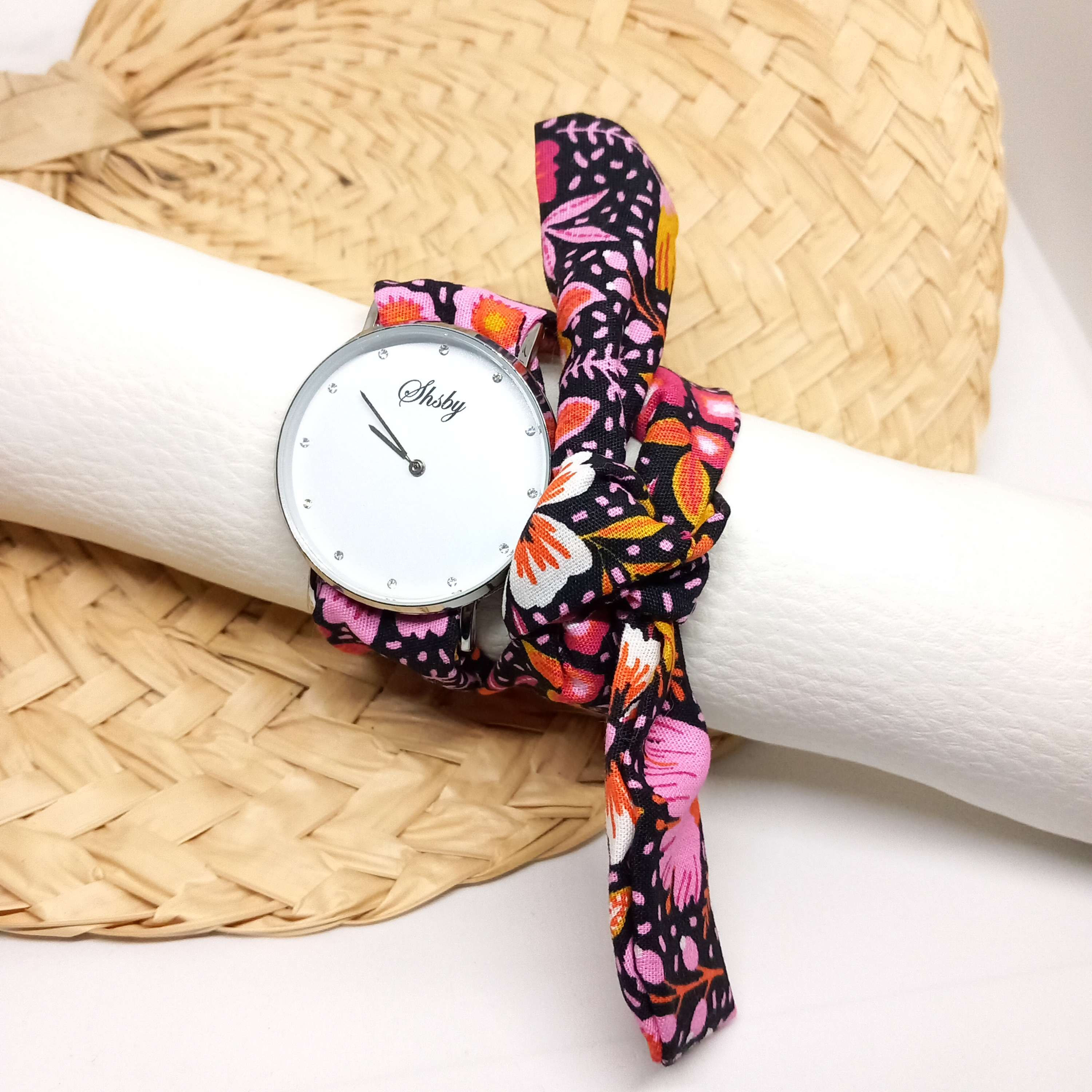 Montre noire et rose 