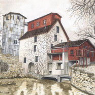 Old sawmill with silo and water