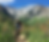 Kid riding a Mountain bike in the high alpine.