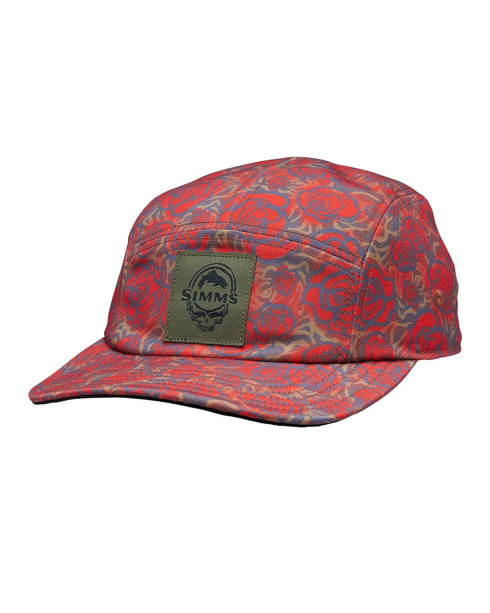 Red patterned SIMMS cap with floral print and green logo patch on a white background