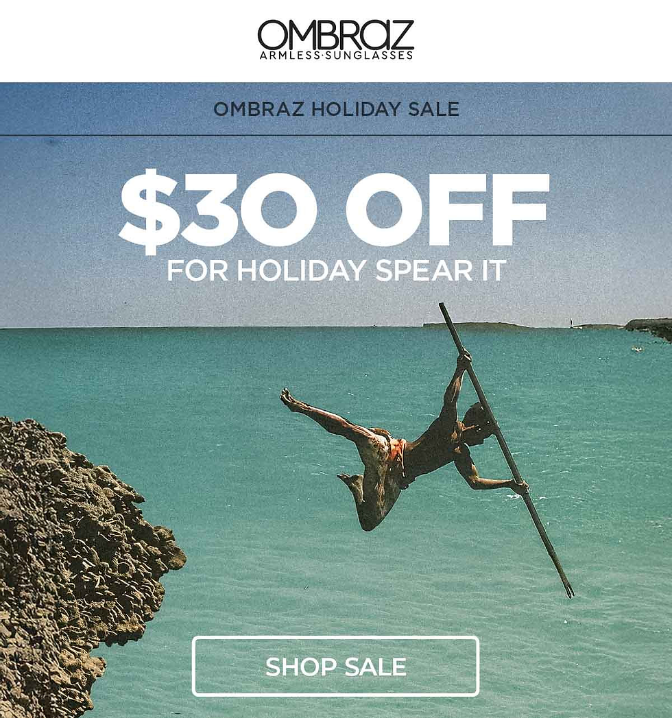 Person diving with a spear into the sea near rocky cliffs. Text: "Ombraz Holiday Sale, $30 Off, For Holiday Spear It, Shop Sale."