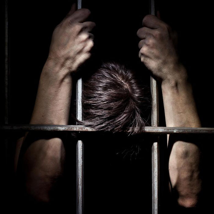 Man behind bars
