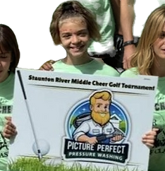 MY DAUGHTER HOLING MY PRESSURE WASHING SIGN AT HER GOLF SPONORED EVENT - Copy_edited.png