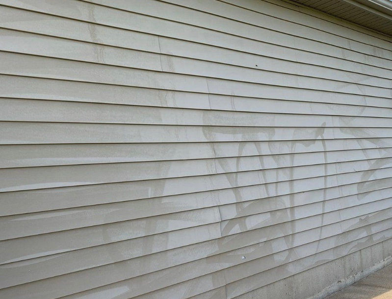 stripes on vinyl siding discolored blotchy spots
