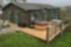 Log cabin with outside deck and hot tub