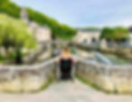 Carrie-Ann Lightley Disabled Travel Blogger overlooking the river in Brantome
