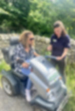 Carrie-Ann getting set up on the Tramper with a staff member from Bowless visitor centre
