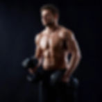 Muscular man lifting dumbbell — representing balance, strength, and inner power