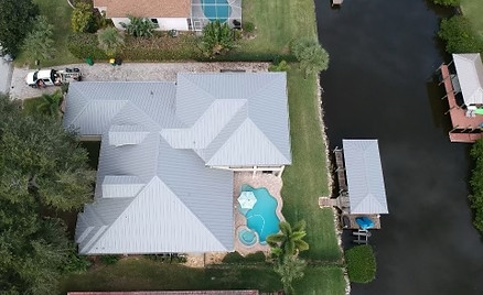 new metal roof home by spilker roofing on the river in brevard county fl