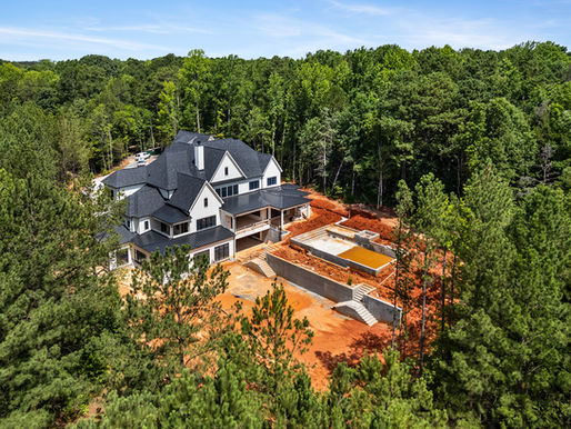 What to Know About Land Leveling and Grading Around Your Custom Home