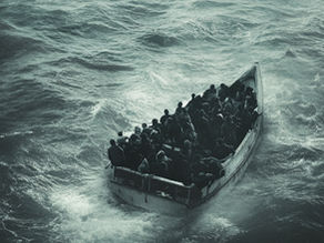 A dark, atmospheric image showing a crowded small boat travelling through rough ocean waters under a foggy grey sky, while silhouettes of birds fly overhead, creating a haunting sense of uncertainty, migration, survival, and isolation.