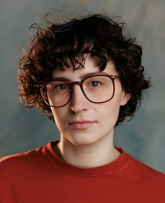 Headshot Glasses 2024.jpg