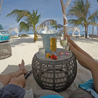 Oksana Turney in Finolhu Maldives on the beach
