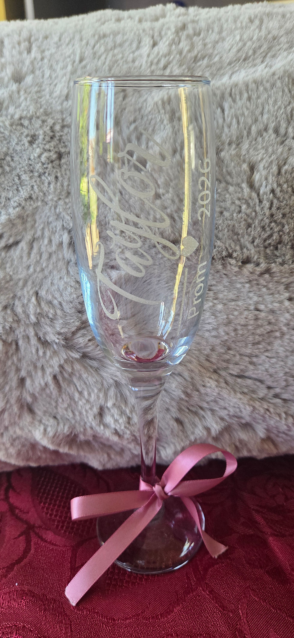Thumbnail: Champagne flute with a pink ribbon and engraving saying Taylor - Prom - 2026