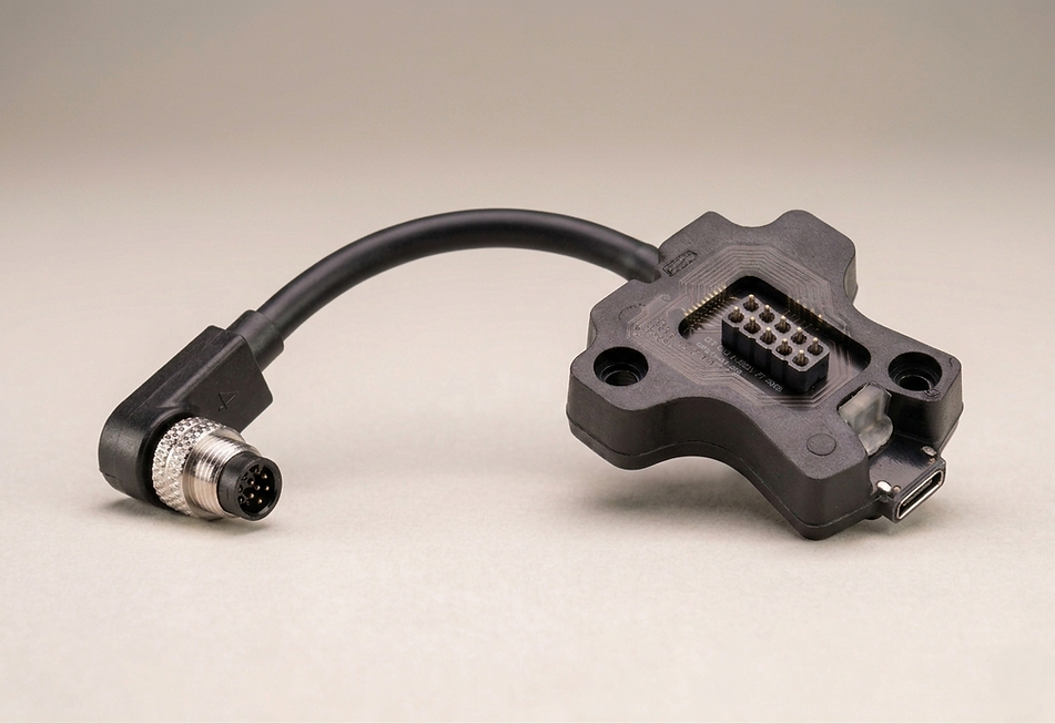 Overmolded PCB with M8 connector.png