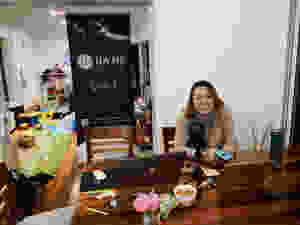 A woman is smiling at the camera