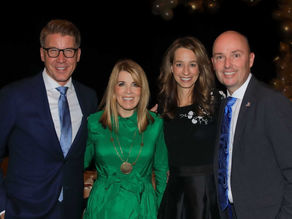 Governor and First Lady Abby Cox awarded Utah Youth Village's Helping Hands Award by Honorary Event Co-Chairs, Andrea and James Clarke.