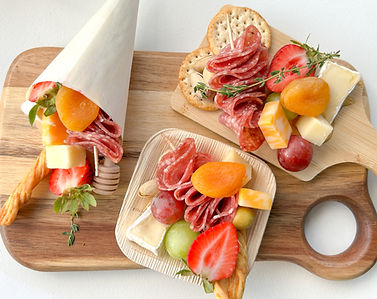 Mobile charcuterie cart serving plates