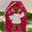 Thumbnail: Gingerbread boy in sweater on red