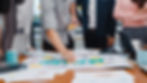 happy-young-asian-businessmen-businesswomen-meeting-brainstorming-ideas-about-new-paperwor