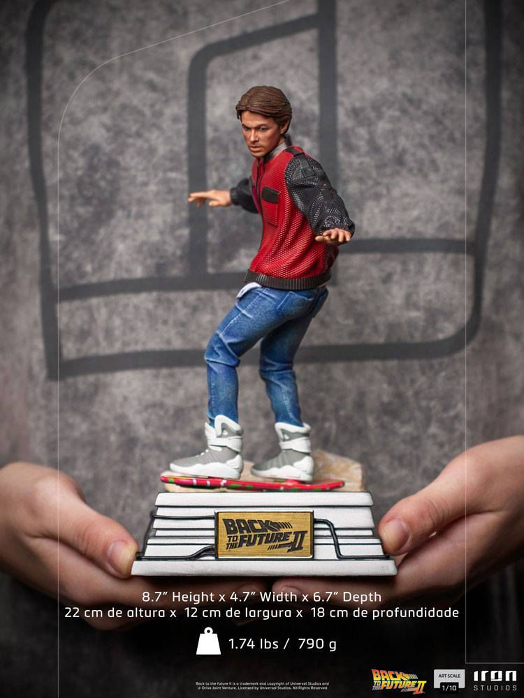 Miniatura: Back to the Future II Art Scale 1/10 Marty McFly on Hoverboard 22 cm by Iron Stu