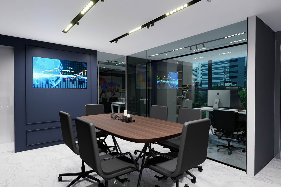 Modern conference room with large screen and glass walls.