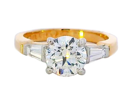 round brilliant cut diamond with tapered