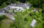 Aerial view of the existing Guest House complex.