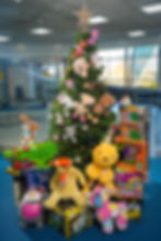 Christmas tree located in the Seven Towers Leisure Centre surrounded by toy donations made by the residents of Mid and East Antrim.