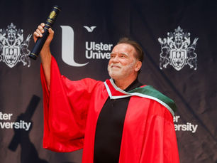Arnold Schwarzenegger returns to Belfast 60 years later for major Ulster University honour