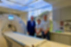 Health Minister Mike Nesbitt with Northern Trust staff, Hannah Liken, CT Radiographer and Seán ÓConaire, Assistant Director.