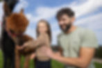 Pictured at the launch of the 2025 Ould Lammas Fair in Ballycastle are local photographer Conor Edgell and his daughter, feeding the alpacas.