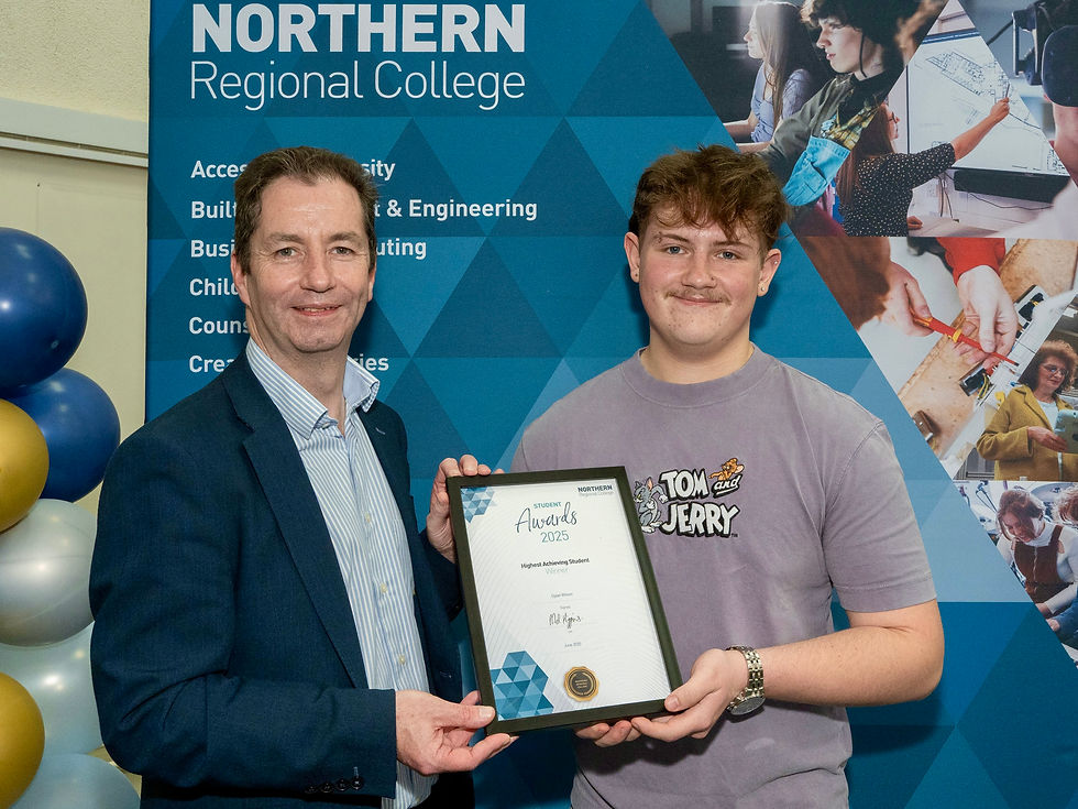 Dylan Wilson, winner of the Highest Achieving Student - Level 3 Computing award, pictured with Mel Higgins, Principal & Chief Executive of Northern Regional College.
