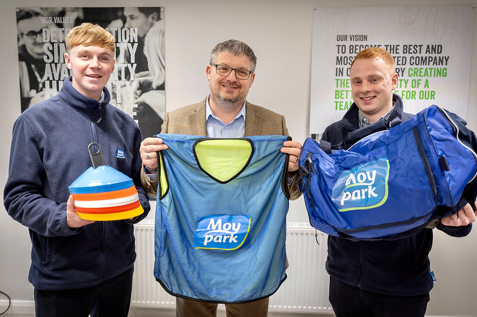 Ben Stevenson (L) and Robin Moore (R) from Moy Park pictured with Richard Topping, Broughshane Primary School.