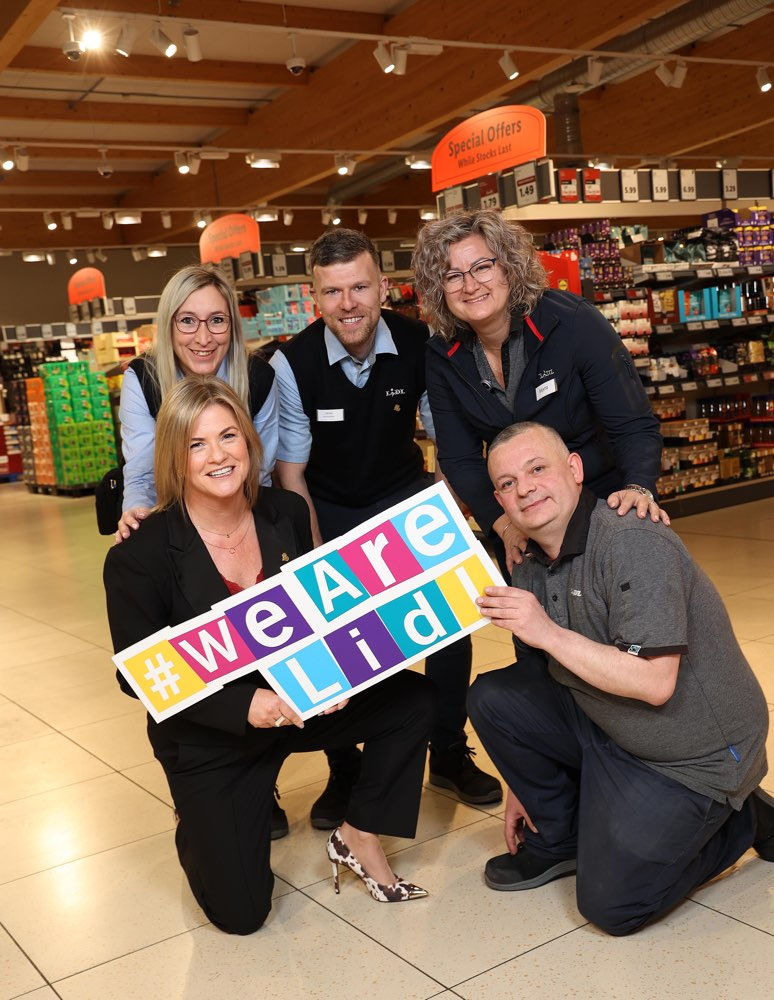 Lidl Northern Ireland announce a £2.3m investment in pay increases for their workforce across the region - pictured is Maeve McCleane, Chief People Officer for Lidl Ireland and Northern Ireland and colleagues from Lidl's store team. 