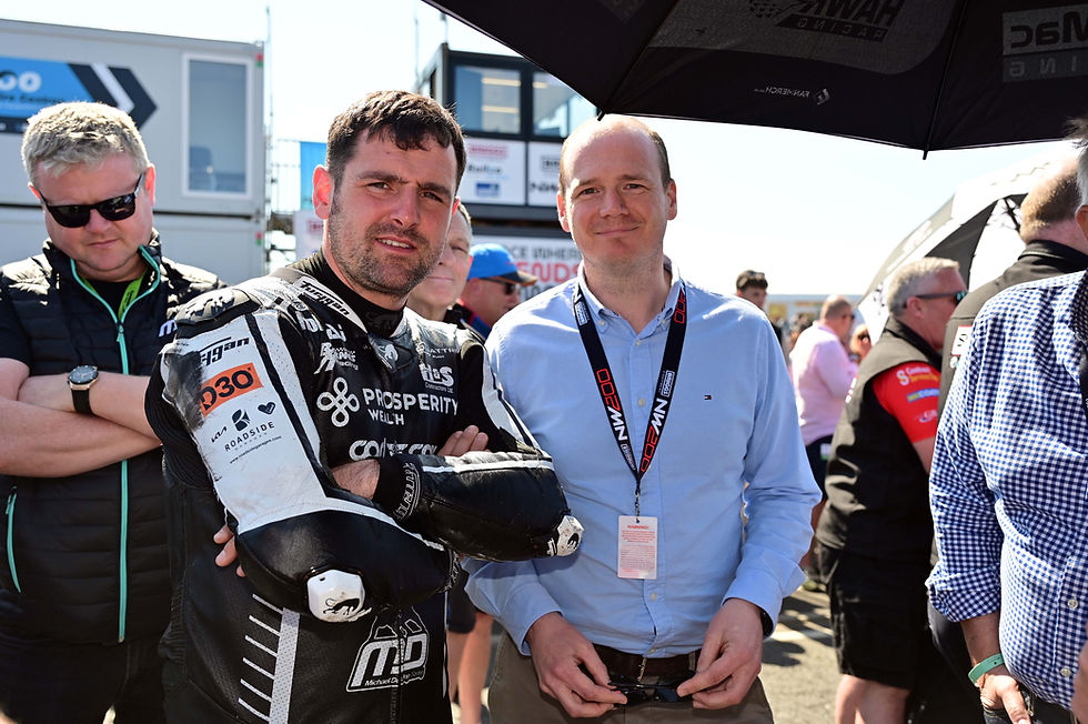 Communities Minister Gordon Lyons meets with Michael Dunlop on the grid of the North West 200.