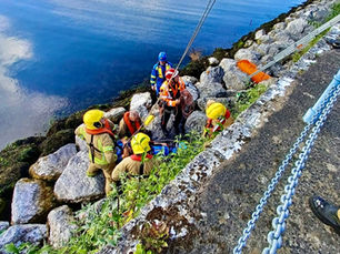Emergency services rescue injured man from rocks at Glenarm Harbour
