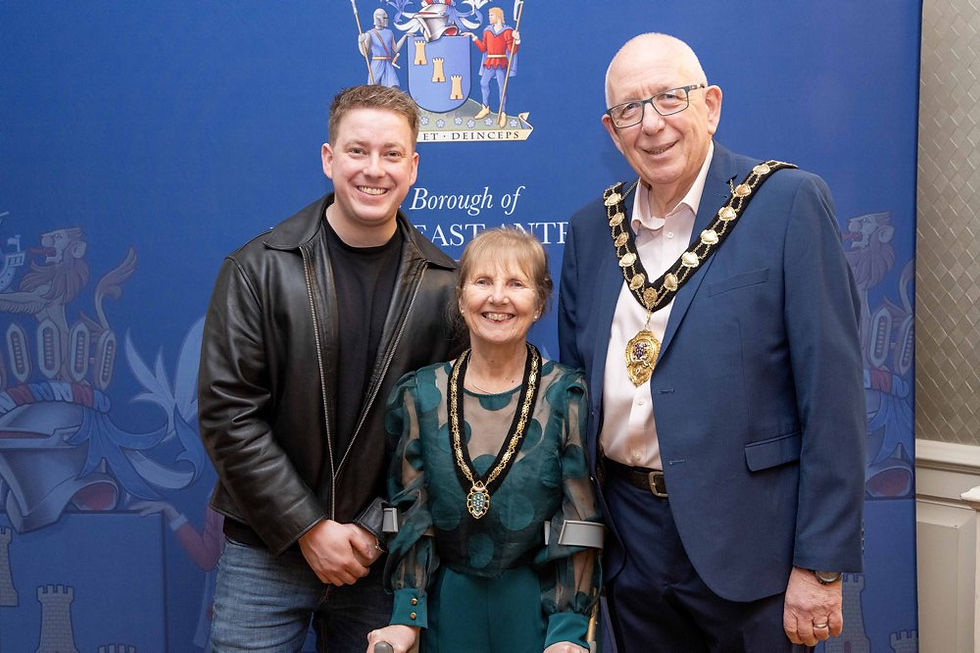 Mayor and Mayoress of Mid and East Antrim, Councillor Jackson Minford and Allison Minford pictured with Tiernán Heffron.