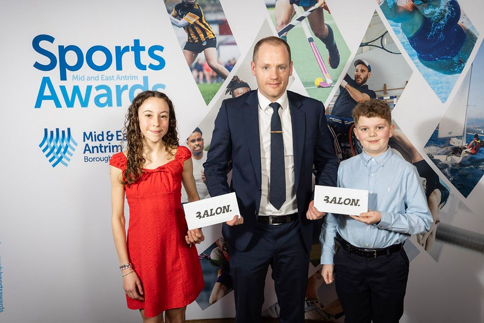 Athlete Naomi McClelland and 12 year old Irish Ice Hockey player Jamie Murray are pictured with sponsor BALON representative Niall Curneen