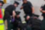 Police making the arrest in Belfast city centre on Tuesday.