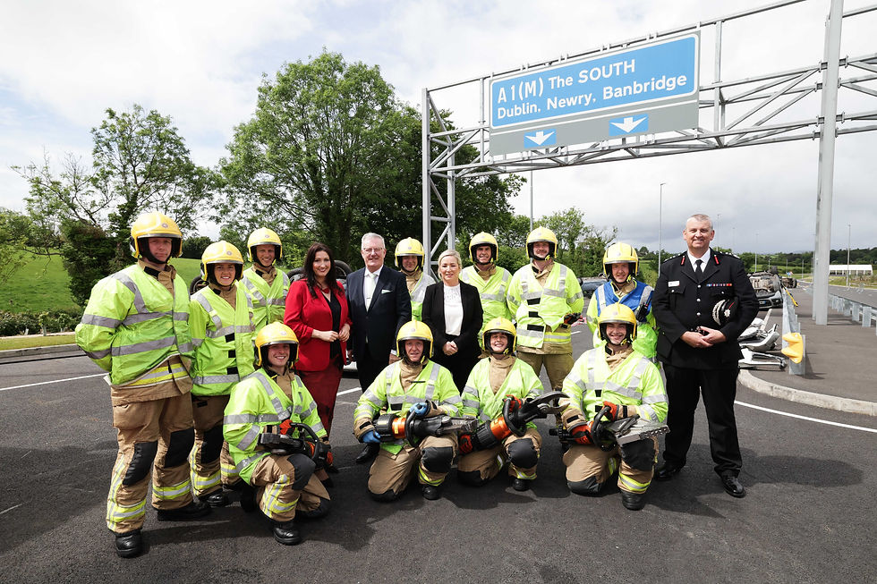 First Minister Michelle O’Neill, deputy First Minister Emma Little-Pengelly and Health Minister Mike Nesbitt are pictured during the official opening with trainee fire fighters.
