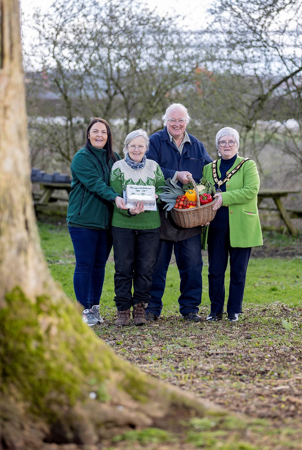 Pictured from (L-R) Carly Ogilvie MEA Council Sustainable Food Coordinator, Linda McCooke, Frank McCooke and Deputy Mayor, Councillor Beth Adger MBE.