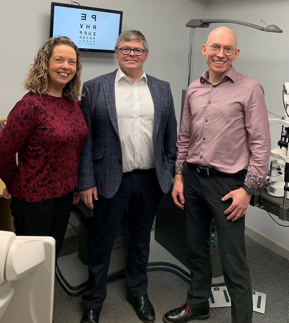 Pictured are Jim Fitzsimons (middle) and John Broderick along with wife Louise in opticians.