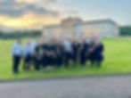 The Farmers’ Choir NI in front of Stormont Parliament Buildings in Belfast