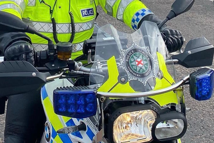 PSNI police motorbike and officer
