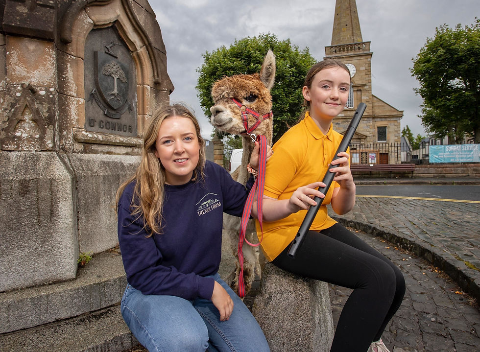 Mary Clare from Trench Farm with a musician from Baile an Chaistil Comhaltas.