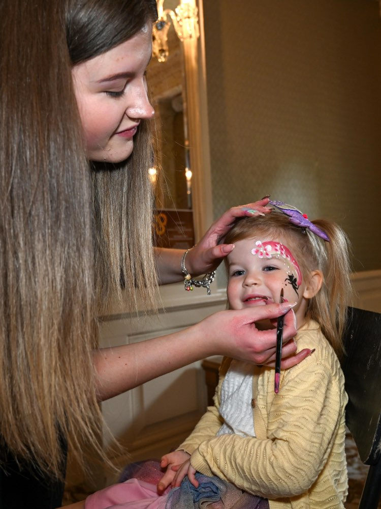 A young attendee having her face painted during Galgorm Collection’s recent employee family fun day.