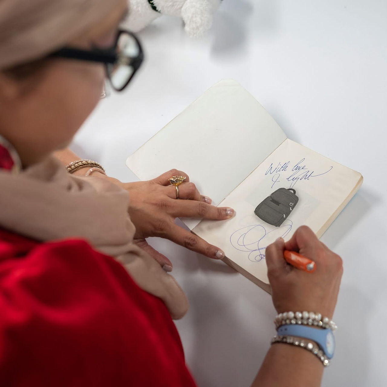 Onjali with a keen and captured audience of Slemish College students while book signing